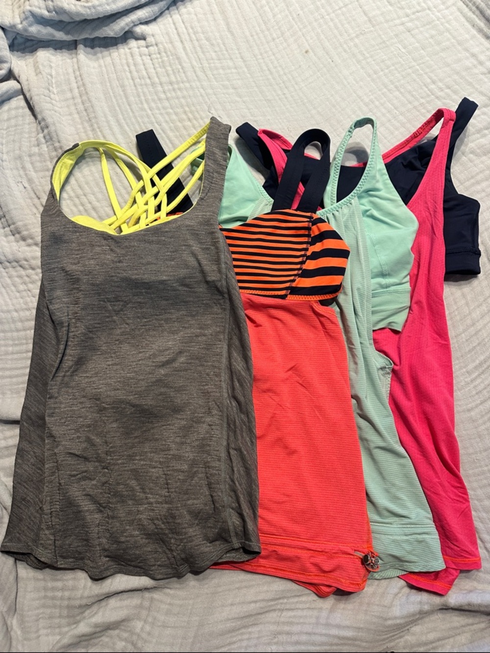 lululemon Tank Tops in grey/yellow, orange/Nancy, teal/grey, Coral/Navy